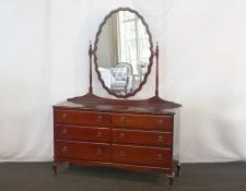   Chest of drawers with oval vanity mirror       $0