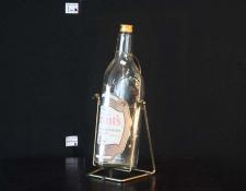 209    Grants Whisky bottle and cradle    $40