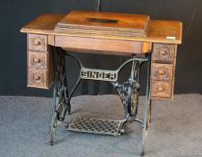   Singer treadle sewing machine       $295
