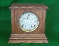 54    Ansonia mantle clock. In excellent condition featuring simple medium brown stained oak case. This striker clock has been serviced and is in good working condition      $195