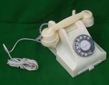 57     .. classic white dial telephone with index drawer . Wired ready to use   $295